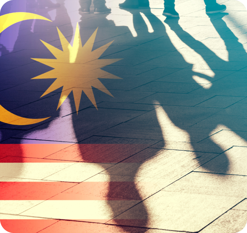 Malaysian flag with silhouettes of people