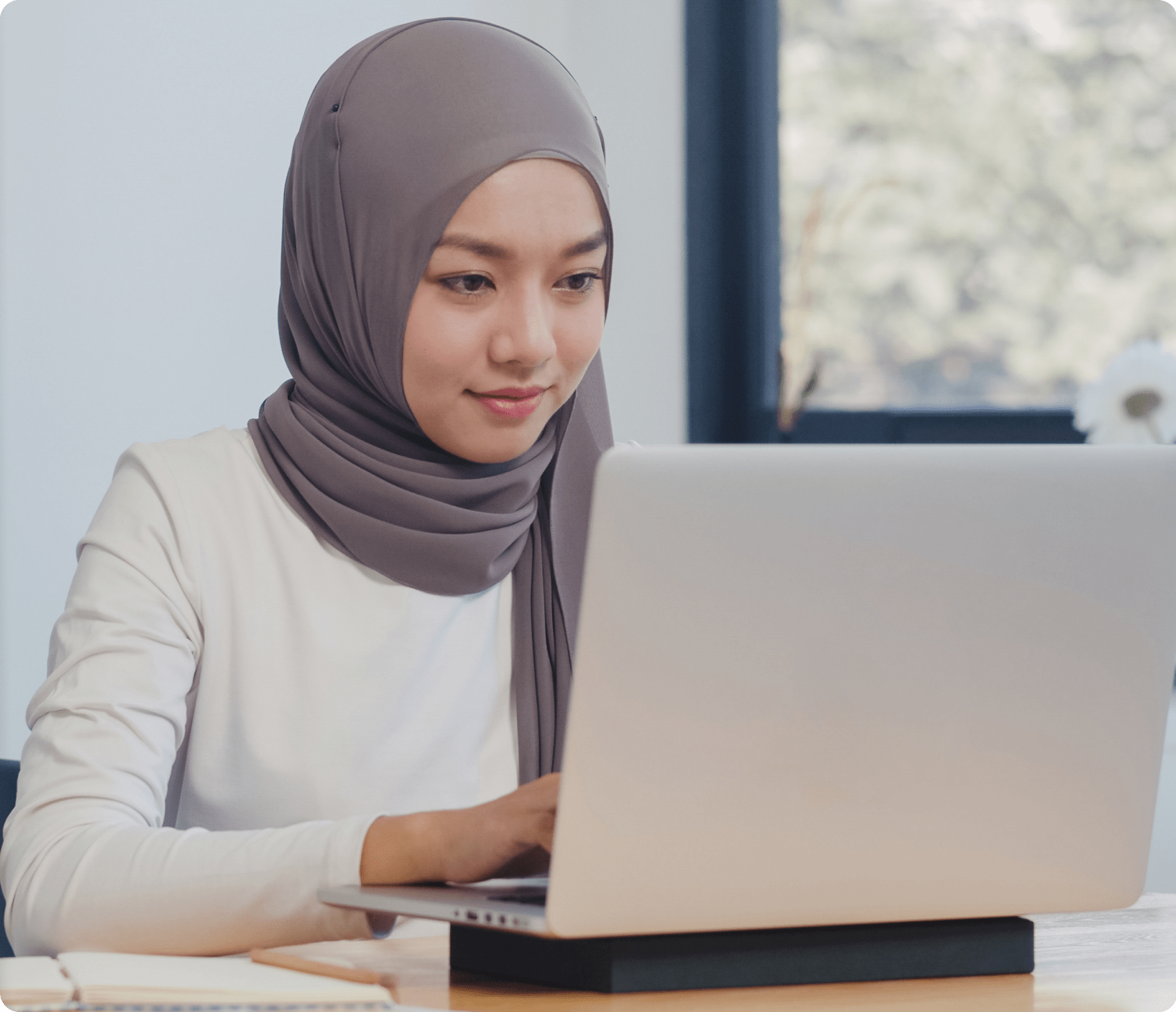Woman working on laptop