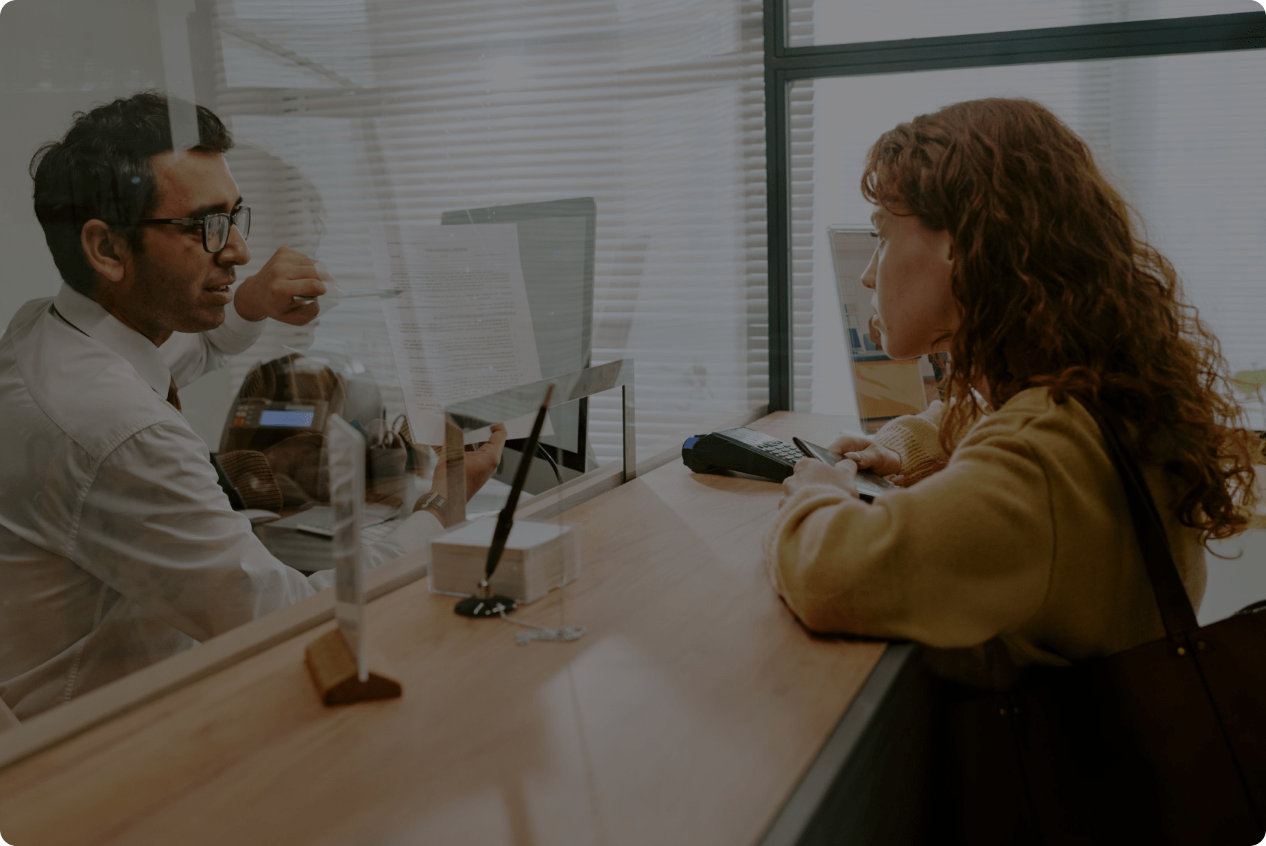Two professionals in discussion about personal loans